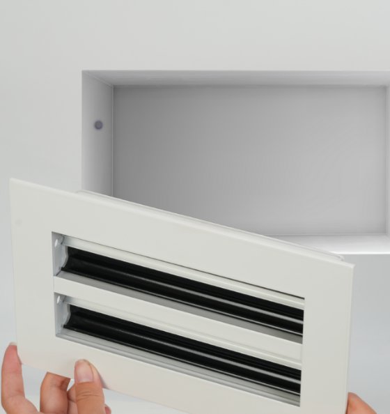 Placing the vent back on the wall