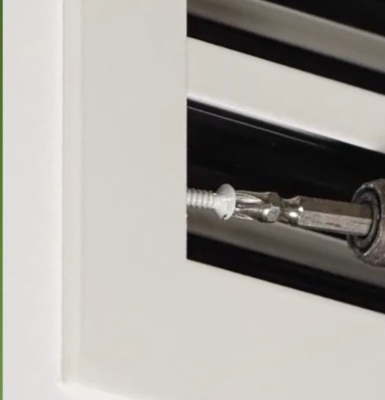 Securing the vent with screws